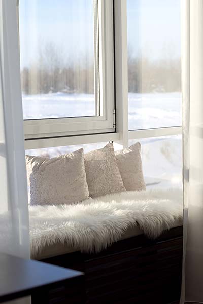 Energy-efficient window installation in Dayton, MN home to reduce heat loss and improve comfort in winter