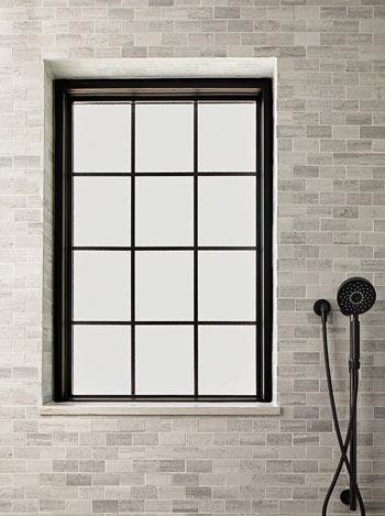 Frosted privacy window installation in Minnetonka, MN home allowing natural light with added seclusion