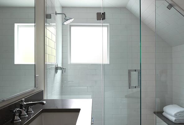 Frosted privacy window installation in Minnetonka, MN home allowing natural light with added seclusion